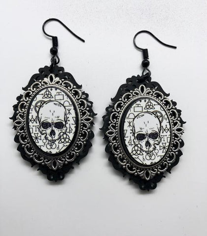 CUR-Occult Skull Earrings